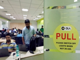 Ola raises $330 mn in fresh round led by SoftBank: Report