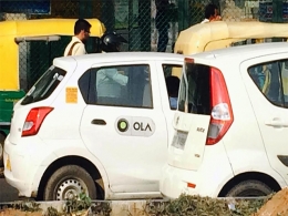 Vanguard joins SoftBank in lowering Ola's valuation