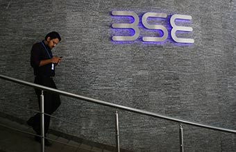 Sensex, Nifty end lower on Friday, capping gains for the week