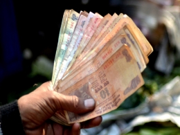 Sensex, rupee stage sharp recovery as RBI governor exit, election results swing sentiment